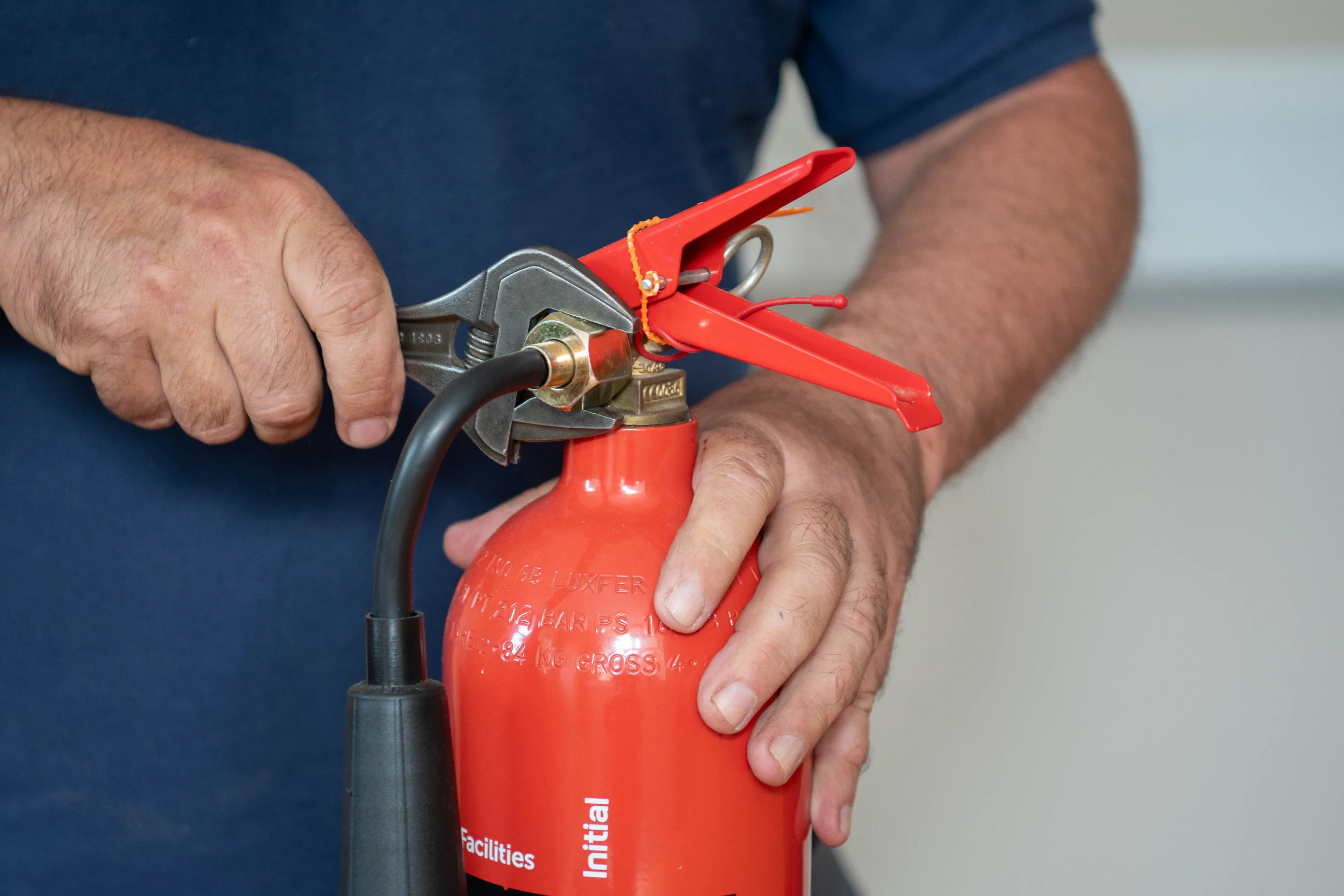 Servicing your fire extinguishers..